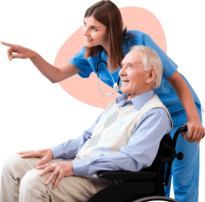 A caring nurse pointing out something to a smiling older patient